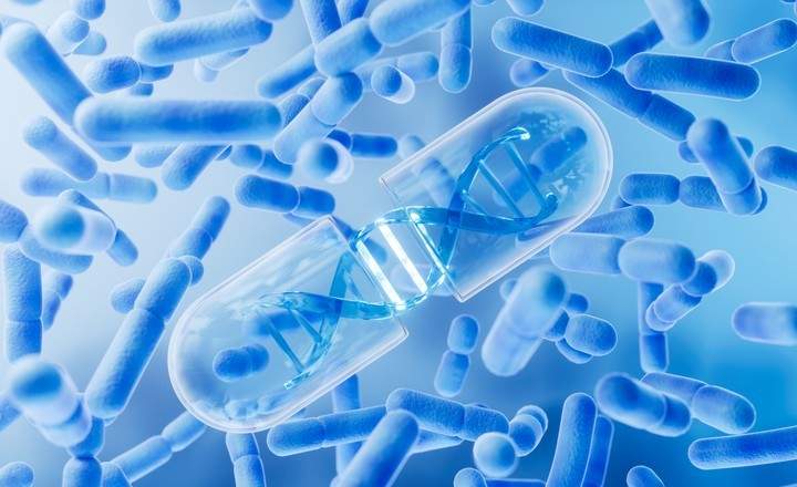 DNA helix inside a clear pill.