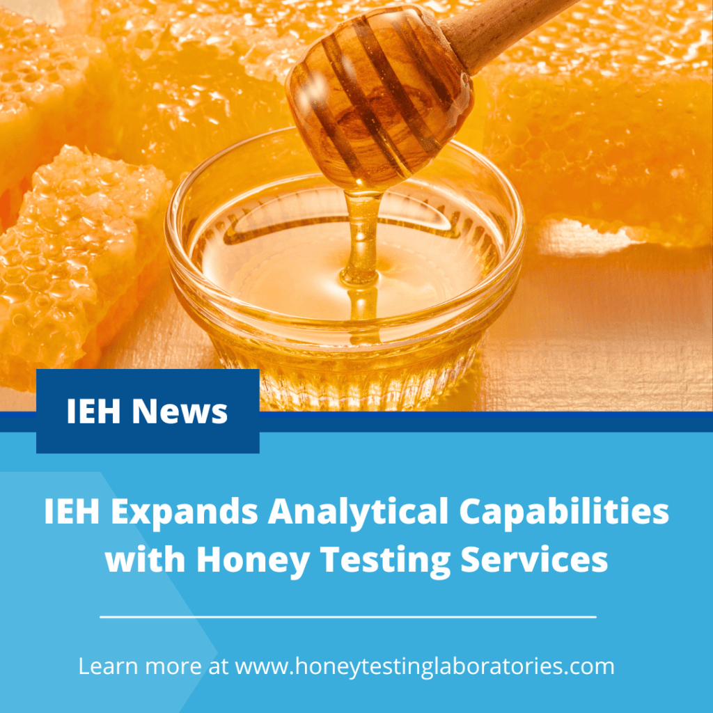 A promotional graphic for IEH News featuring a close-up photo of golden honey dripping from a wooden dipper into a small glass bowl, surrounded by fresh honeycombs. The bottom half of the image has a blue background with white text that reads: "IEH Expands Analytical Capabilities with Honey Testing Services." Below this, a call to action says, "Learn more at www.honeytestinglaboratories.com."